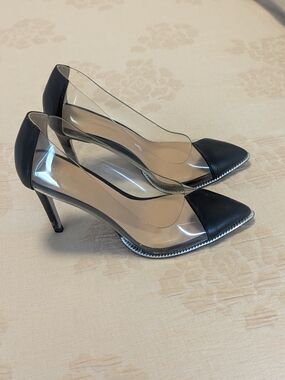 BCBG Black and Clear Pointed-Toe Stiletto Pumps with Silver Trim